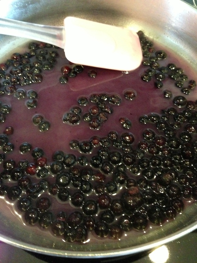 Adding blueberries to blueberry sauce
