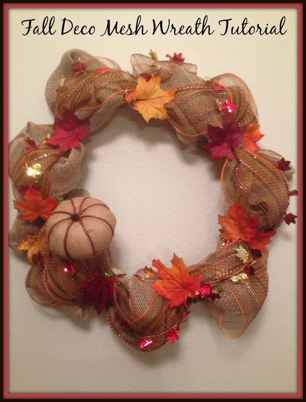 The Fall Deco Mesh Wreath I used burlap and a brown mesh to give it some accent. I used a burlap pumpkin, wire garland & some fall leaves as embellishments.