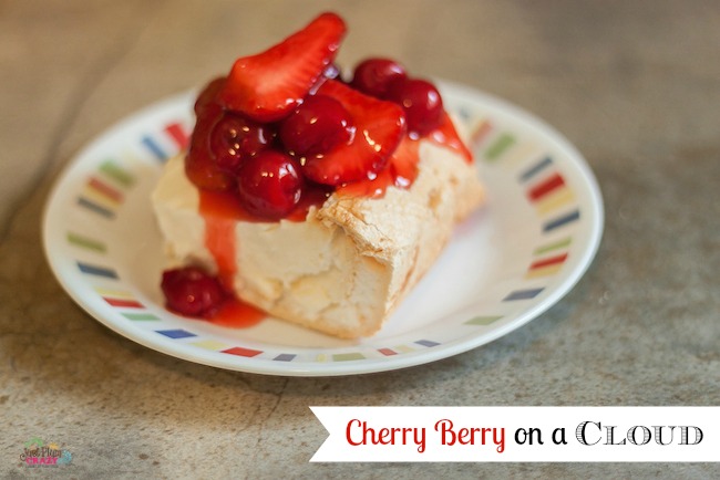 Cherry Berry on a cloud is a decadent & delicious melt in your mouth light, fluffy meringue, cream cheese, marshmallows, and a strawberry cherry topping.