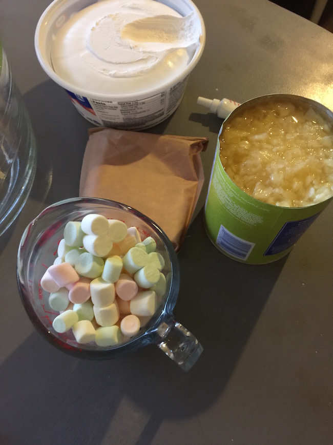 What's great about the Angel Fluff Salad Recipe is that you can make it any color you want for any holiday! I made it pink for Valentine's Day.