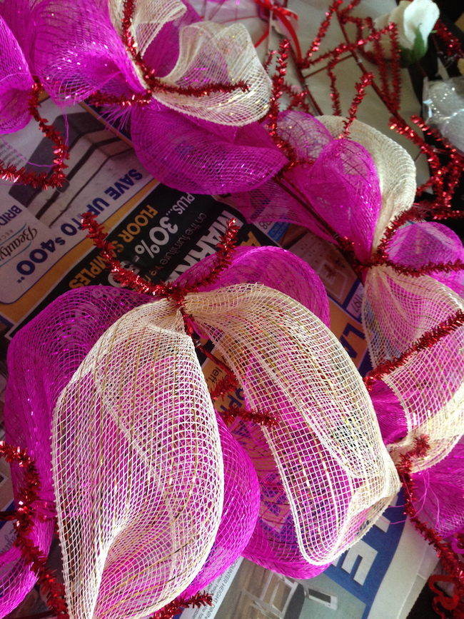 I am going to show you just how easy it is to make a Valentine's Day Deco Mesh Wreath and if I can do it, anybody can! Once you try it, you won't stop!