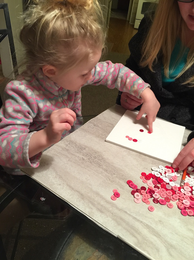 The canvas Heart Button Craft is another great Valentine's Day toddler craft. We made these for the Sunday School Teachers and they loved them.