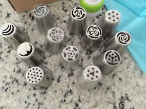 12 Russian Piping Tips, pastry bag & adapter. I like that you can make a flower with one swipe and don't have to create each petal separately.