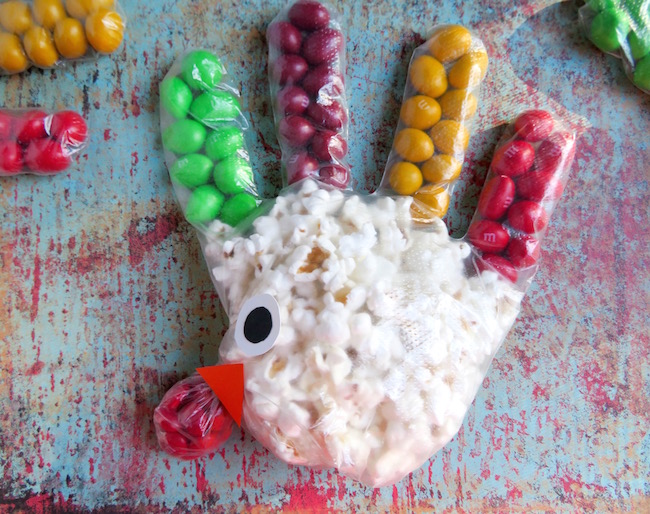 The kids can help you make the Popcorn Turkey Hands recipe and are great for a school party or the kid's Thanksgiving table. 