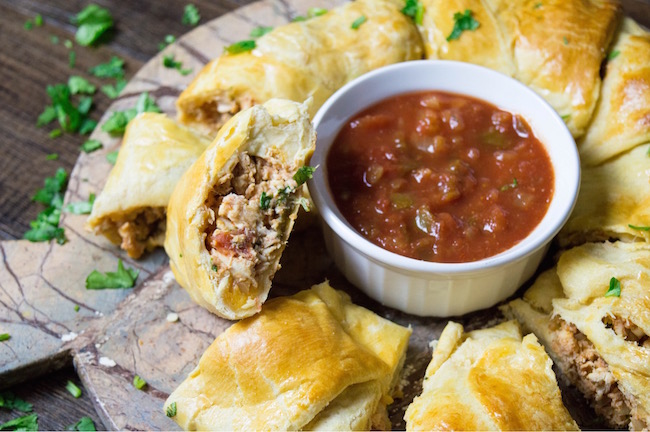 Another perfect recipe for your game day party is the Chicken Salsa Ring Recipe where you can easily substitute rotisserie chicken for the cooked chicken.