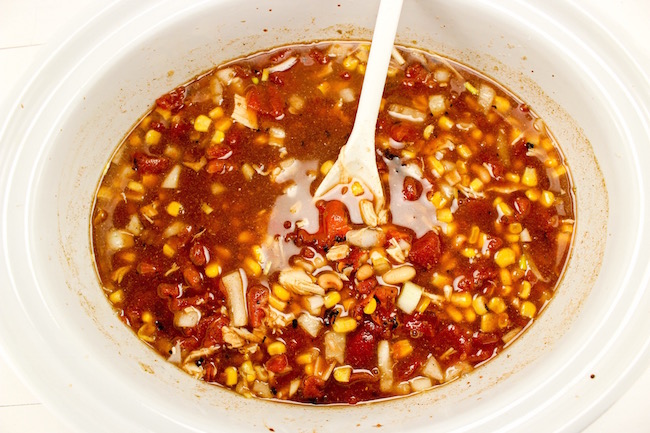 The Crockpot Chicken Chili recipe great to pop in the slow cooker in the morning before you leave for work or even the night before and start it up.
