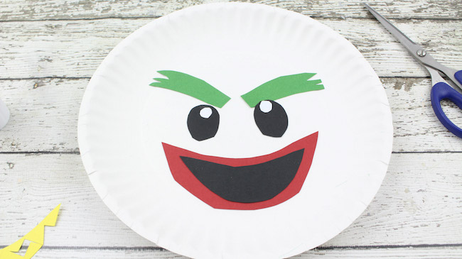 The Joker Paper Plate Craft Tutorial is my favorite. I don't know if it's the hair or what but it is definitely the most fun looking. 