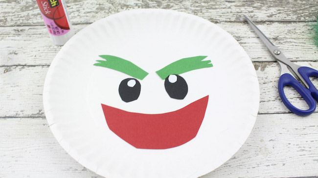 The Joker Paper Plate Craft Tutorial is my favorite. I don't know if it's the hair or what but it is definitely the most fun looking. 