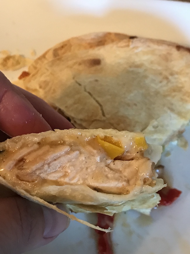 Inside melted goodness of chicken quesadilla 