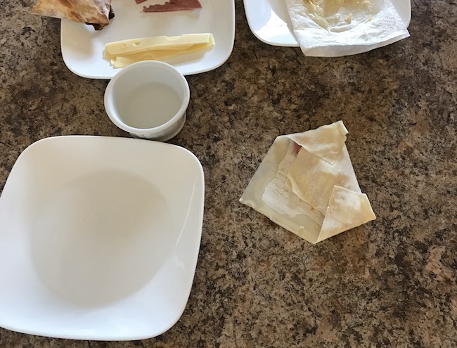 Air Fryer Reuben Egg Rolls recipe for St. Patrick's Day is filled with Corned Beef, Melted Swiss Cheese, Sauerkraut and dipped in 1000 Island dressing.