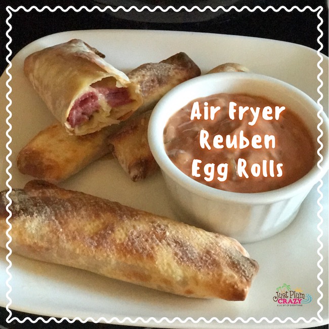 Air Fryer Reuben Egg Rolls recipe for St. Patrick's Day is filled with Corned Beef, Melted Swiss Cheese, Sauerkraut and dipped in 1000 Island dressing.