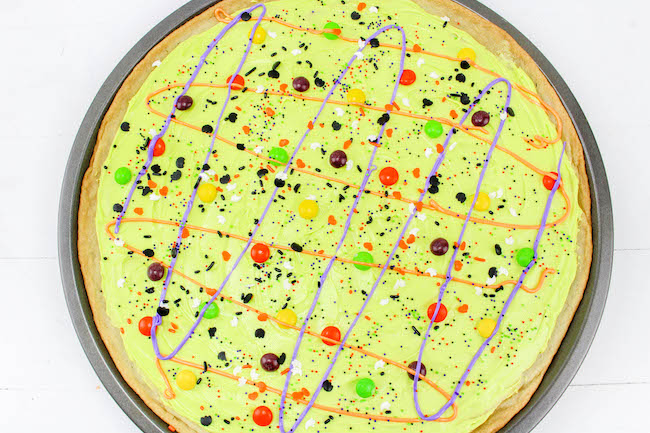 Here is a simple but fun Halloween cookie pizza recipe. There is enough for the entire class or even used as a dessert. It doesn't get any easier than this.