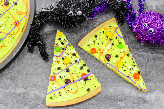 Here is a simple but fun Halloween cookie pizza recipe. There is enough for the entire class or even used as a dessert. It doesn't get any easier than this.