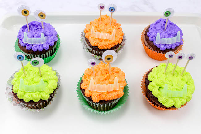 These Halloween Monster Cupcakes recipe sure won't scare anyone at your holiday get together. They are just too cute to be scary. 