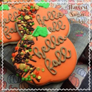 Adorable pumpkin shaped harvest sugar cookie.