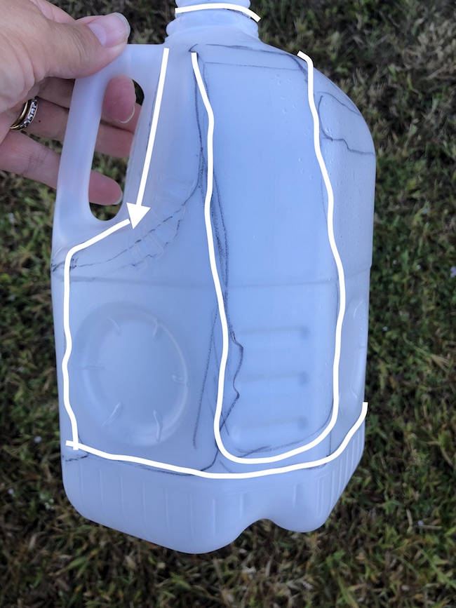 I can use the Milk Jug Angel on my table as a decoration on top of a flameless candle and the light shines through or as a tree top decoration.