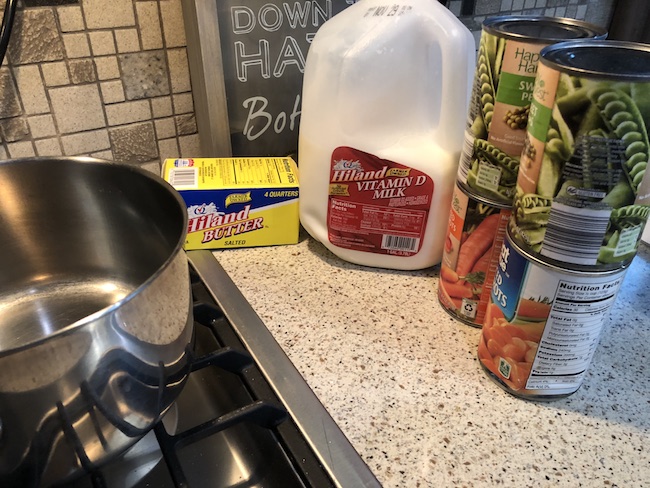 I can use the Milk Jug Angel on my table as a decoration on top of a flameless candle and the light shines through or as a tree top decoration.