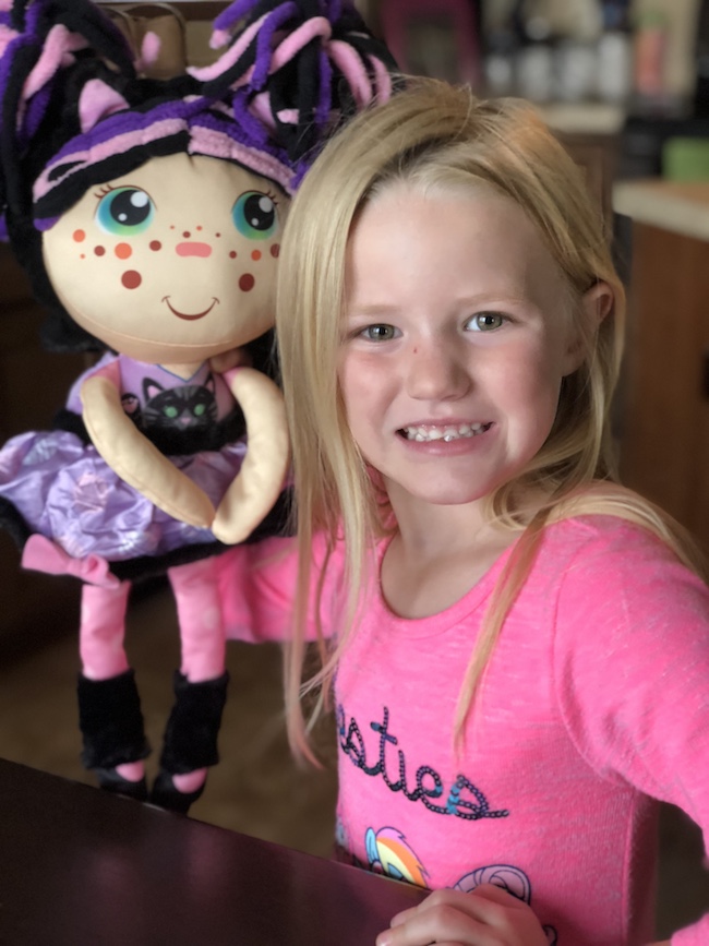 Have you seen the commercials for the Flip Zee Girls yet? They are a doll that converts from a baby to a big girl, by simply flipping the bonnet or swaddle. 
