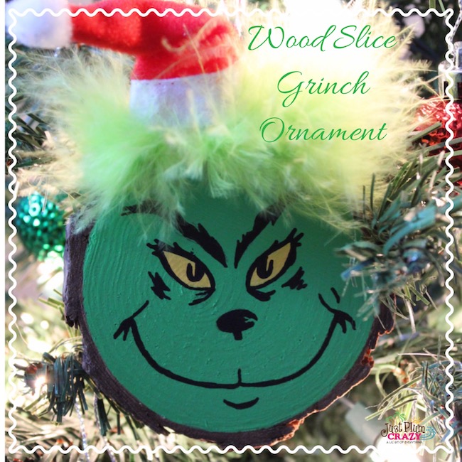 Wooden grinch ornament on my Christmas tree. Isn't he sweet?