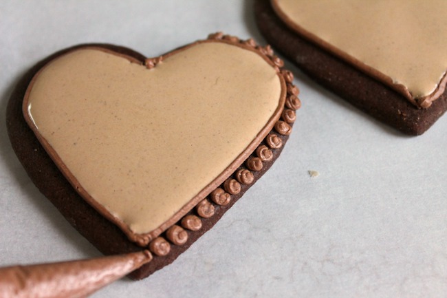 Coffee liqueur icing adds a unique flair to these adult Valentine’s Day cookies. The rich flavor and classy appearance will be appreciated – and so will your efforts with these Kahlua Mocha Heart Cookies recipe.