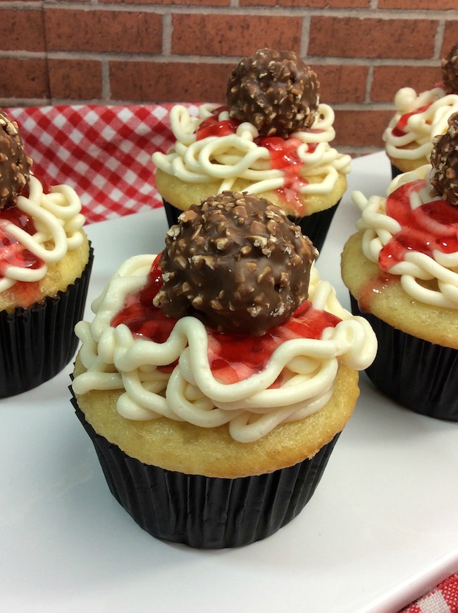 Finishing off National Spaghetti Day with a cupcake! Here we have a twist on spaghetti and meatballs with a Spaghetti and Meatball Cupcake recipe. WHAT? Yeah, that's different alright! 