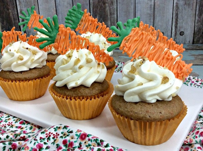Carrot cake isn't only for Easter, but since it's early this year, we are sharing a Carrot Cake Cupcakes Recipe with Chocolate Carrots. In honor of National Carrot Cake day, we thought it fitting to share the perfect recipe for it. 