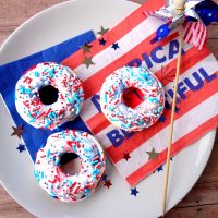 Another one of family favorite recipes that not only tastes good but is easily made with a cake mix. The 4th of July Cake Mix Donuts Recipe is fun and perfect for any patriotic party including picnics.