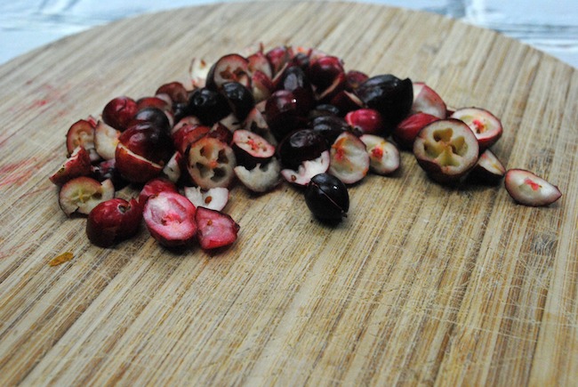 Preheat your oven to 350 degrees. Line your cookie sheet with parchment paper. Sift the flour, baking soda, cinnamon, ginger, allspice, cloves, salt into a bowl. Set aside. Next using an electric mixer on high, beat the butter and vegetable shortening until blended, about 1 minute. Add the brown sugar, a tablespoon at a time then beat the mixture for about 2 minutes. Continue to beat while adding in the molasses and the egg. Using a wooden spoon at first, slowly mix in the flour mixture then work the dough together with your hands. Add the dried cranberries and chocolate chips. Mix well. Make the dough into a large ball then cover it with cling wrap. Place the bowl of dough into the refrigerator until chilled. (About 3 hours). Remove the dough from the refrigerator and let stand at room temperature until just warm enough to make into round balls the size of a teaspoon. Bake at 350 degrees for 10 to 12 minutes. Remove from the oven allowing the cookies to cool and sprinkle each cookie with powder sugar. Enjoy!Preheat your oven to 350 degrees. Line your cookie sheet with parchment paper. Sift the flour, baking soda, cinnamon, ginger, allspice, cloves, salt into a bowl. Set aside. Next using an electric mixer on high, beat the butter and vegetable shortening until blended, about 1 minute. Add the brown sugar, a tablespoon at a time then beat the mixture for about 2 minutes. Continue to beat while adding in the molasses and the egg. Using a wooden spoon at first, slowly mix in the flour mixture then work the dough together with your hands. Add the dried cranberries and chocolate chips. Mix well. Make the dough into a large ball then cover it with cling wrap. Place the bowl of dough into the refrigerator until chilled. (About 3 hours). Remove the dough from the refrigerator and let stand at room temperature until just warm enough to make into round balls the size of a teaspoon. Bake at 350 degrees for 10 to 12 minutes. Remove from the oven allowing the cookies to cool and sprinkle each cookie with powder sugar. Enjoy!